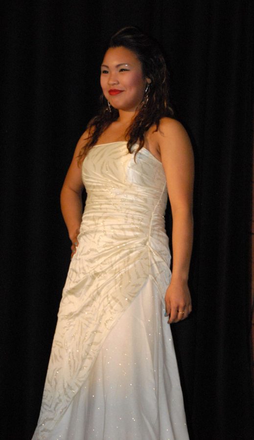 GILA sophomore Danyal Harvey models a prom dress during the Fifth Annual Boutique and Fashion Show during the March 15 show.