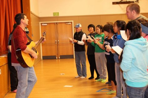 Young Life participants sing a song during their gathering in the SHS elementary gym.