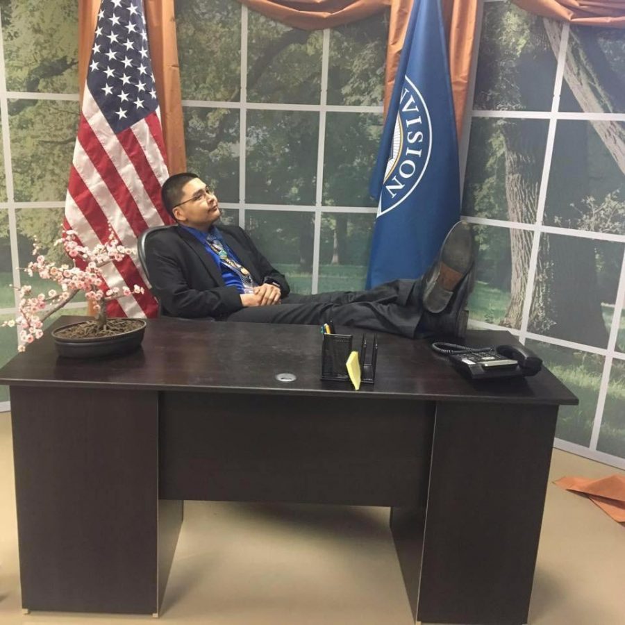 Corey Tuzroyluke ponders the future of the nation in this mock-up of the Oval Office at the conference hall where he attended workshops and meetings during the inauguration.