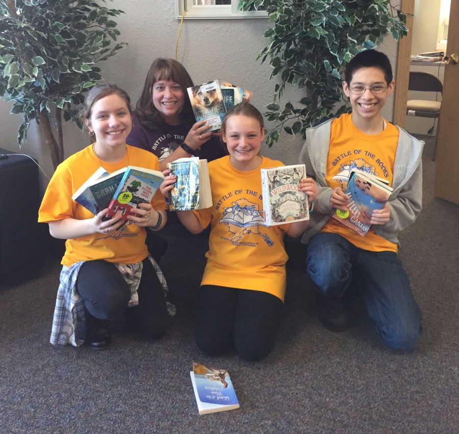 The Galena junior high Battle of the Books team is, from left, Abigail Landrum, coach Genny Brown, Sable Scotton, and Alex Cruz, an IDEA student from Wasilla.