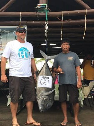 New GILA assistant principal David Huntington, at left, is shown here with a 68-pound ulua, a Hawaiian sports fish.