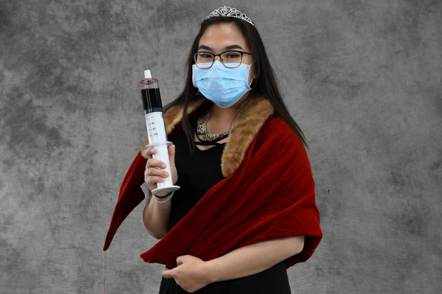 Sharon Gililia, class of 2021, shows off her pandemic best at last years Halloween Carnival.